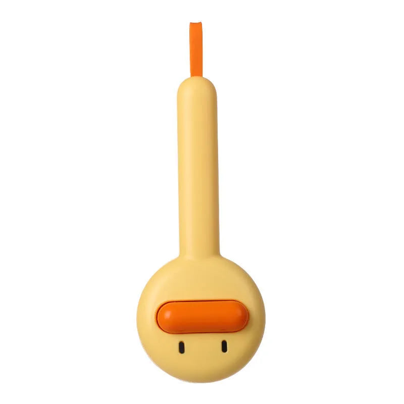 Small yellow duck-shaped pet comb for cat and dog grooming with open-section needle design