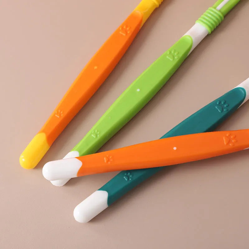 A pet toothbrush with a plastic nylon head and handle, shown in one of its available colours.