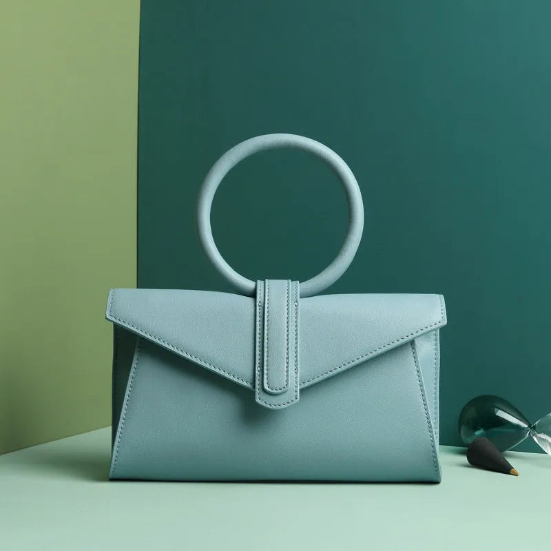 Women's one-shoulder diagonal small pocket envelope bag in cowhide with polyester lining, candy colour