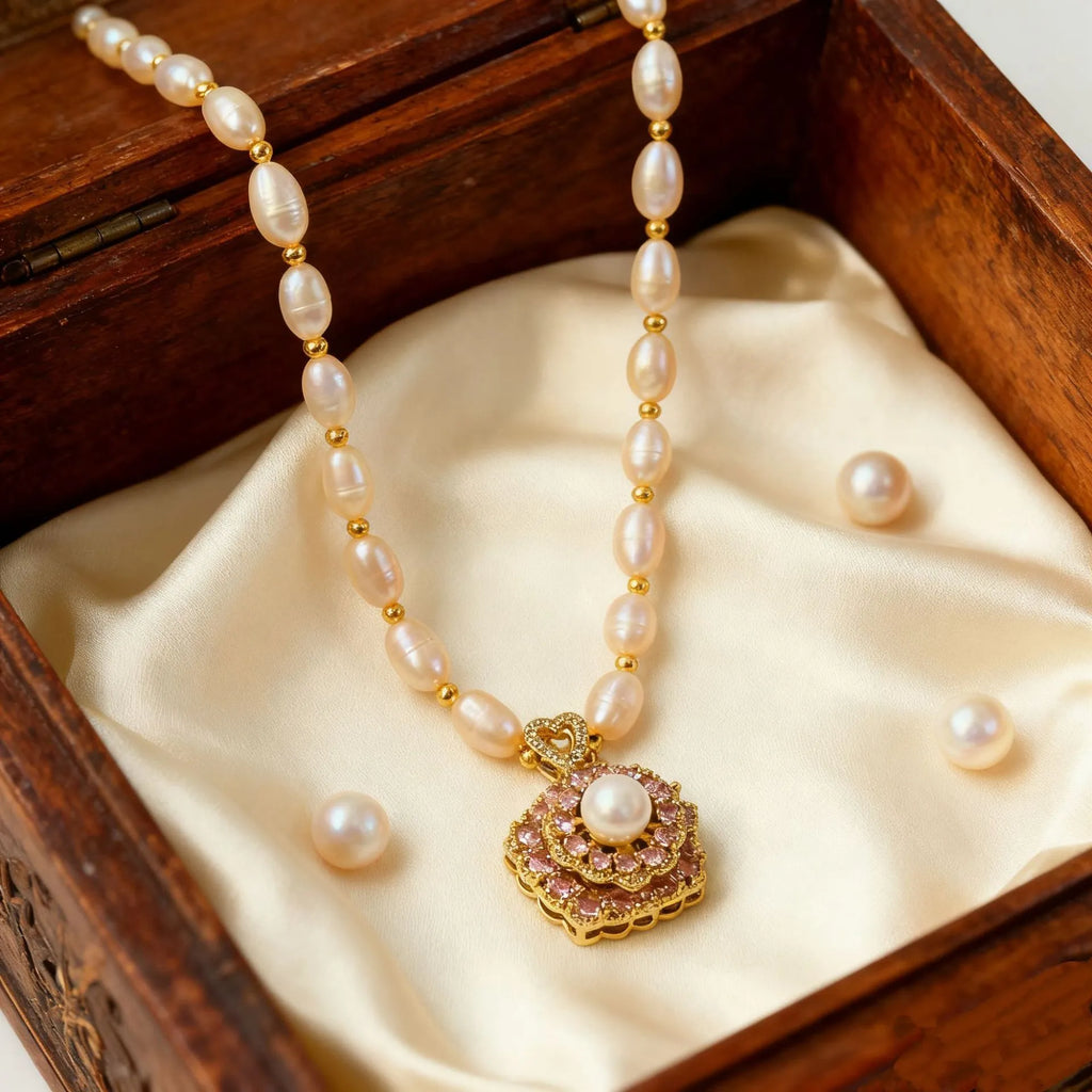 Natural freshwater pearl transfer bead necklace in pink with auspicious pattern and adjustable clasp