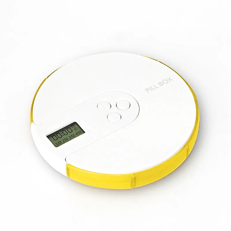 Blue 7-compartment weekly pill organiser with built-in digital alarm clock display, showing 11cm size.
