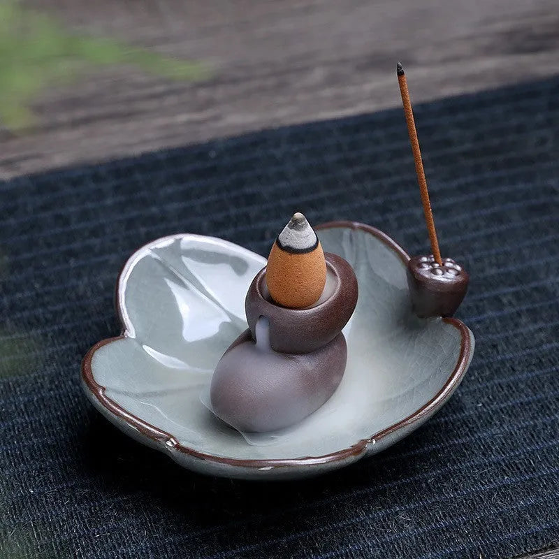Purple clay ceramic reverse flow incense burner with New Chinese style good luck motifs