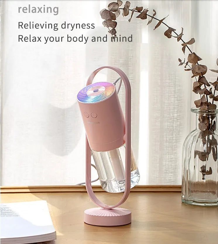 Magic Shadow USB air humidifier with projection lights in pink, blue, or white colours