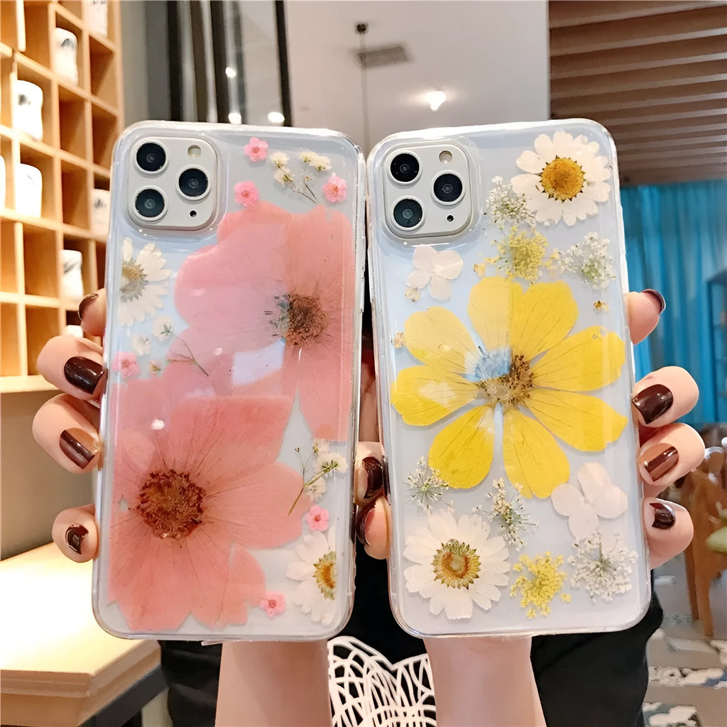 Pink and yellow floral patterned TPU back cover case for iPhone on a white background.