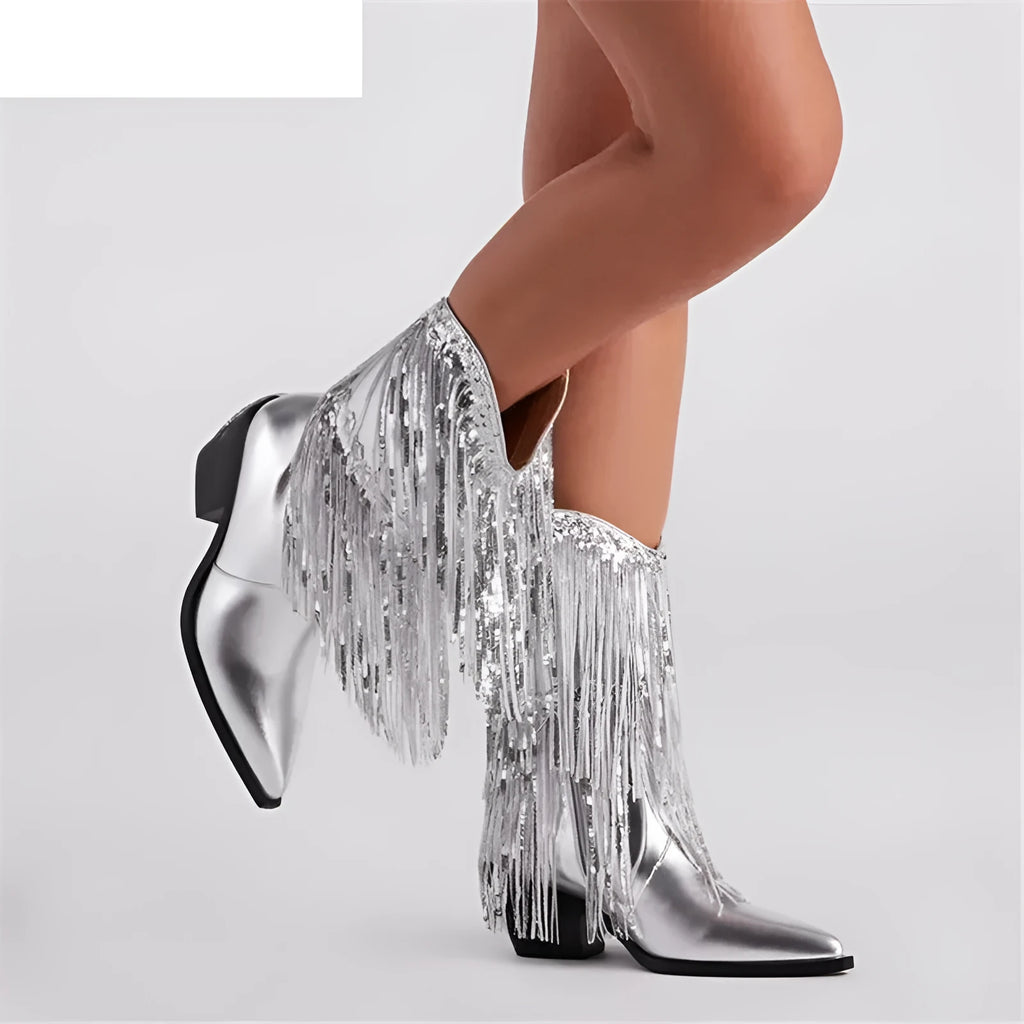 Women's black chunky heel ankle boots with tassel decoration and a high stiletto heel.