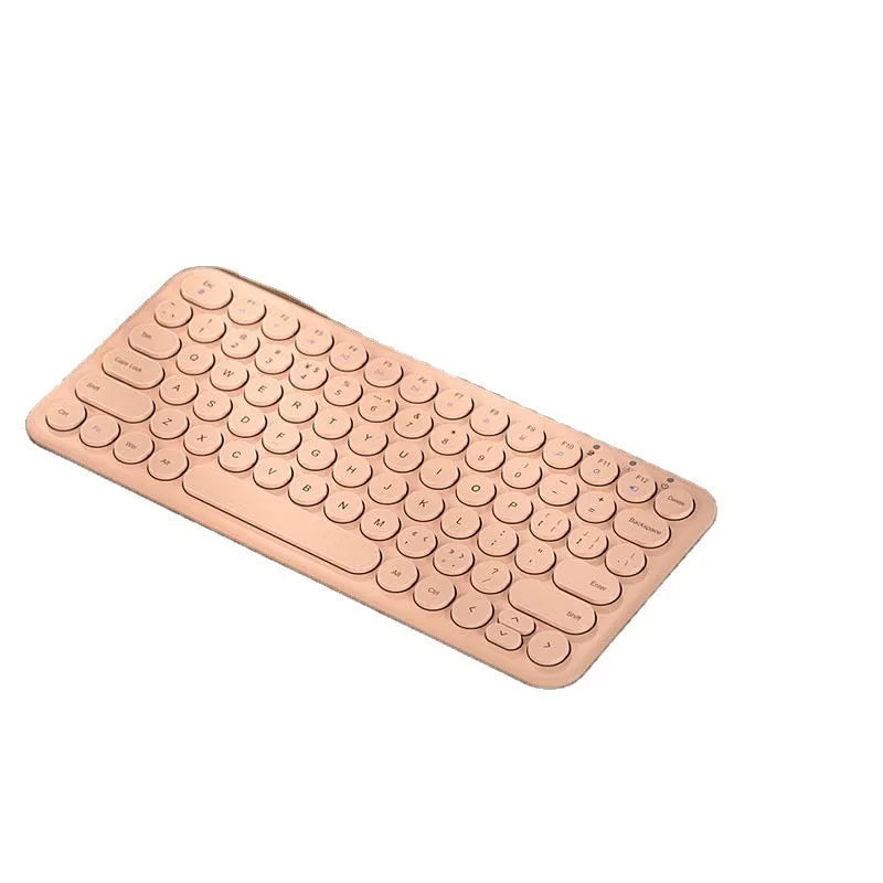 Mute white ultra-thin wireless keyboard and mouse with small USB receiver on a wooden desk.