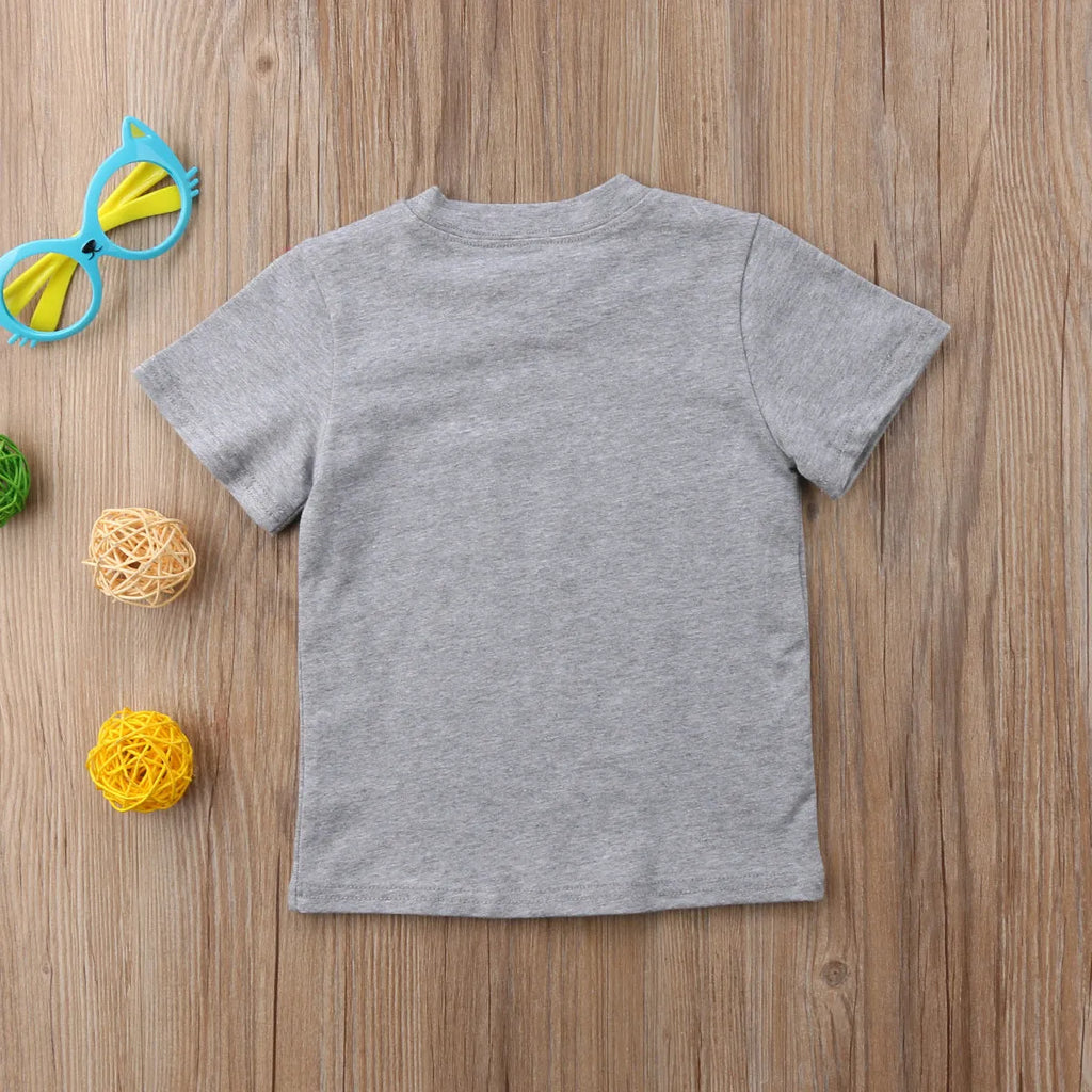 Grey printed cotton t-shirt shown in sizes for children and adults.