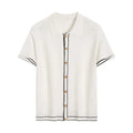 White short-sleeve cardigan with dark contrast lapels, shown on a model, old money style.