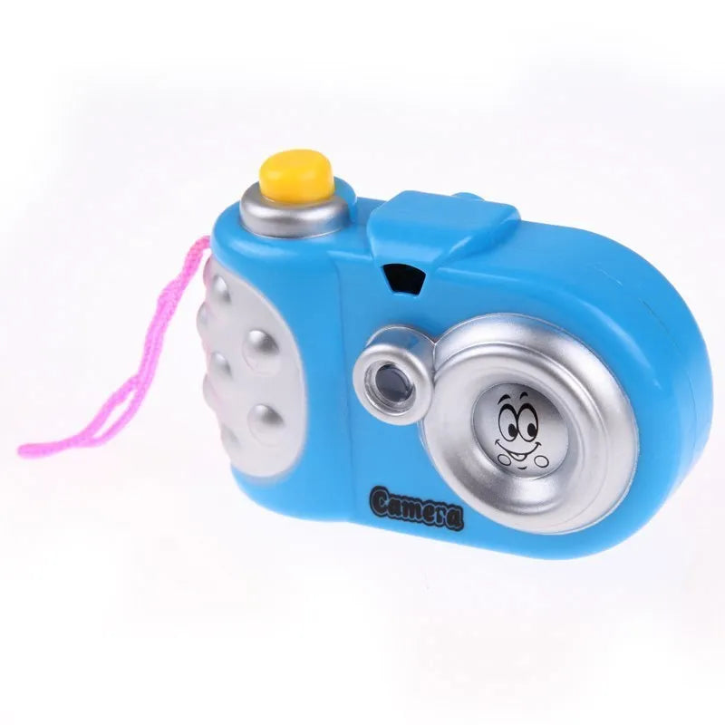 Blue or pink plastic kids toy projection camera with a sliding lens cover on a white background.