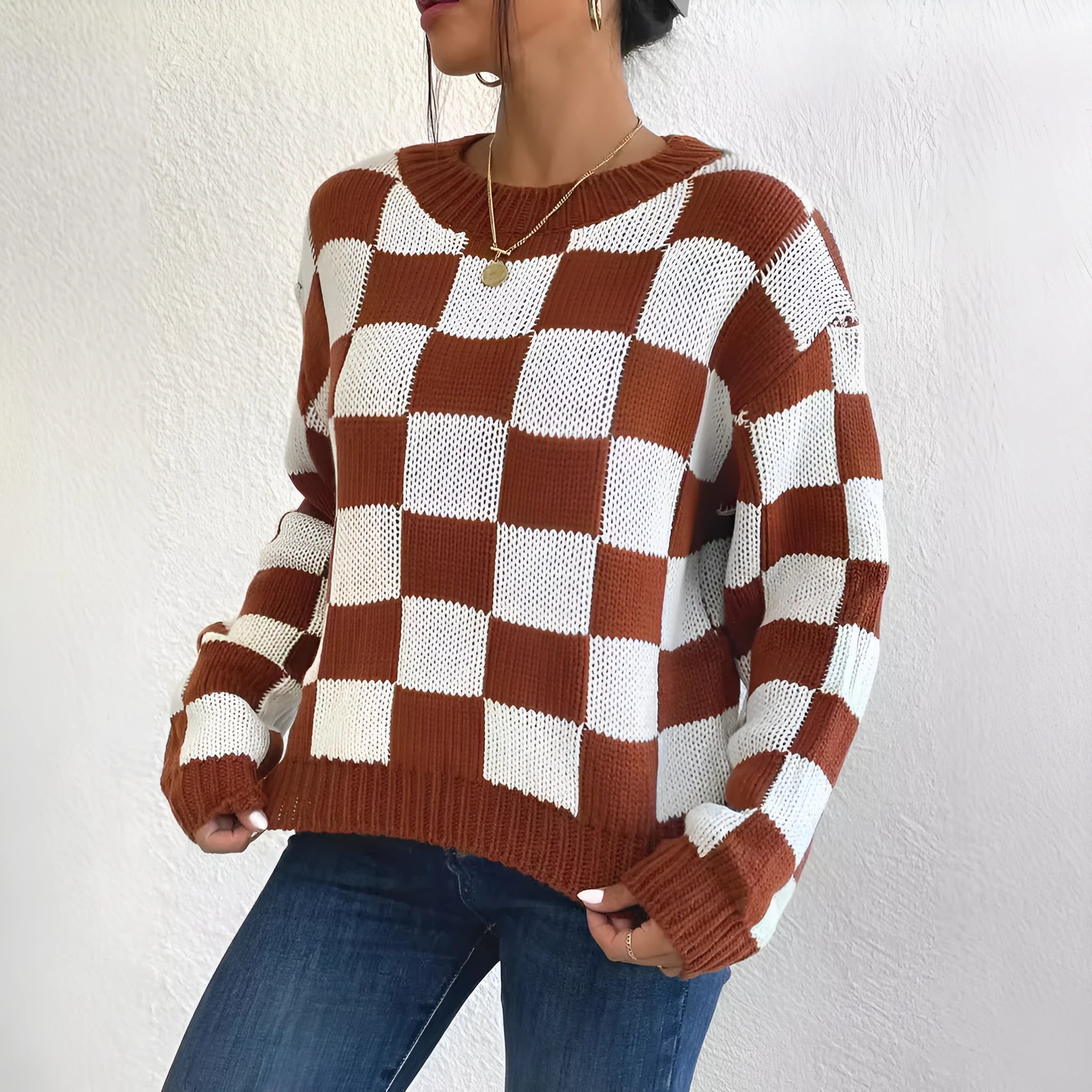 Dark brown acrylic pullover sweater with a chessboard plaid pattern, loose fit, and round neck.