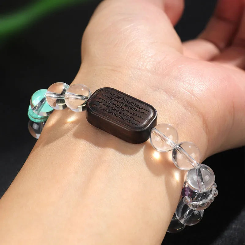 Natural white crystal ebony five warp bracelet showing handmade ethnic design with wood and crystal materials