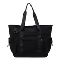 Lightweight Oxford cloth duffel bag for women in grey, shown with a yoga mat.