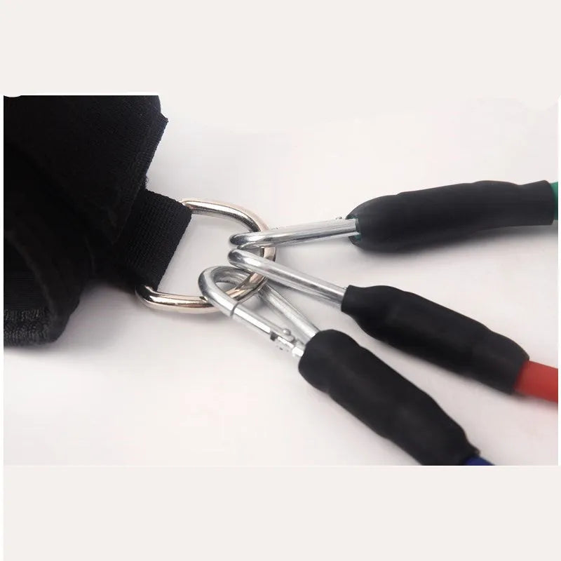 Black elastic taekwondo training pull rope set for leg strength and kicking power.