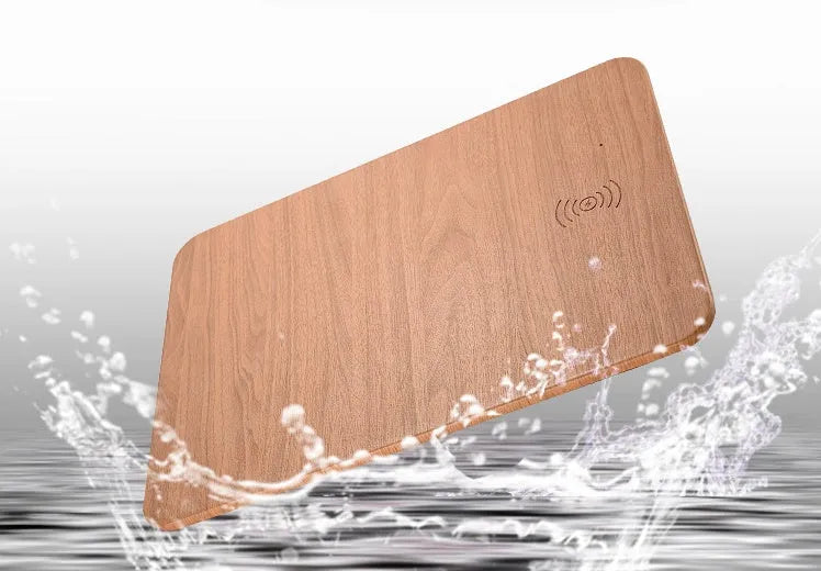Wooden wireless charger with PU leather surface in brown finish on a desk
