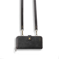 Detachable leather wallet phone case in black, shown fitted on an iPhone 12 Pro Max.