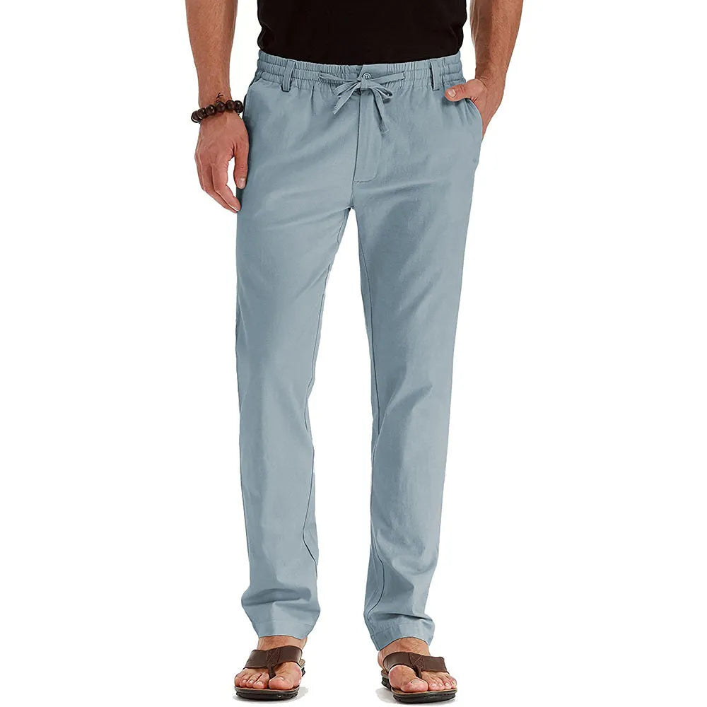 Men's loose oversized cotton blend straight-leg track pants in army green, front view