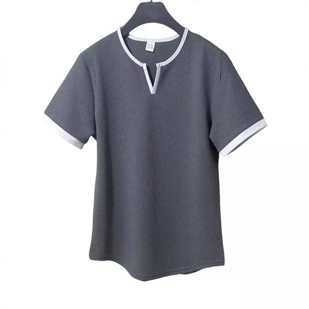 Colour-block V-neck short sleeve t-shirt in polyester waffle fabric on a neutral background.