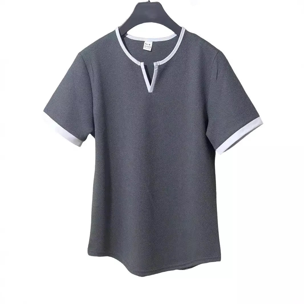 Colour-block V-neck short sleeve t-shirt in polyester waffle fabric on a neutral background.