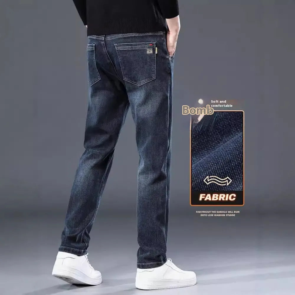 Men's slim straight casual trousers in blue grey and black colours, showing mid-waist and zipper fly detail.