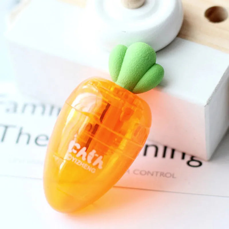 Carrot-shaped plastic pencil sharpener showing colourful design and 7cm length measurement