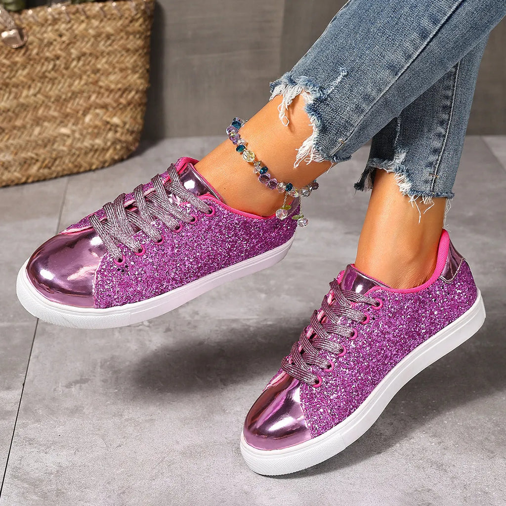 Women's plus size sequinned board shoes in black with front lace-up detail.