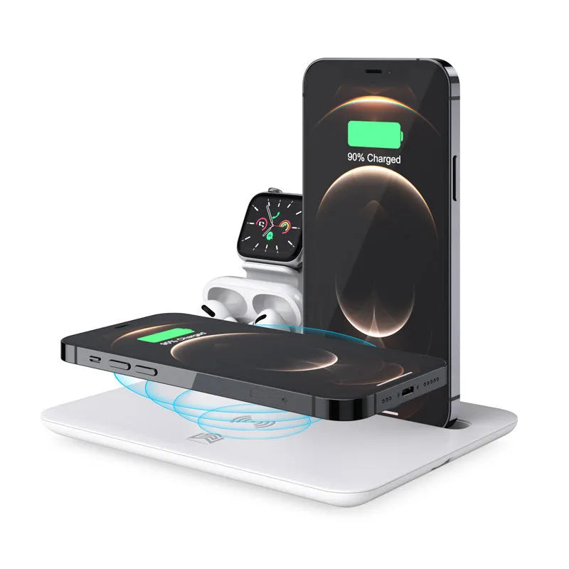 Black desktop charging hub showing wireless phone pad, USB port, watch port, and headphone charging dock.