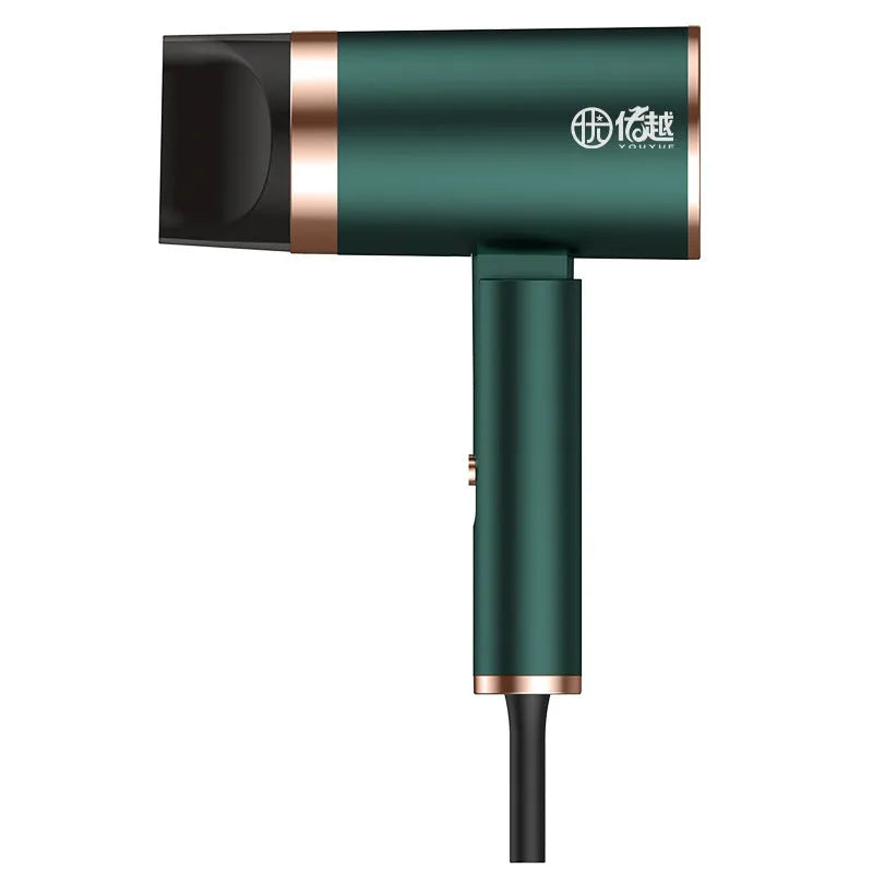 Foldable negative ion hair dryer in emerald green with folding handle design