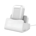 White headphone charging base with fashion design on desk