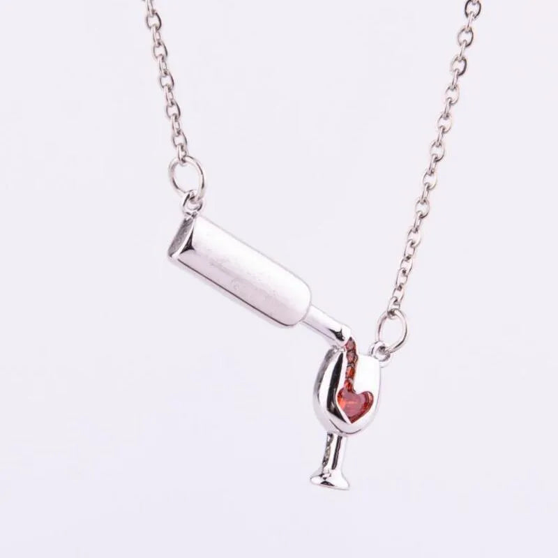 Wine bottle and cup pendant necklace with red enamel heart on gold chain