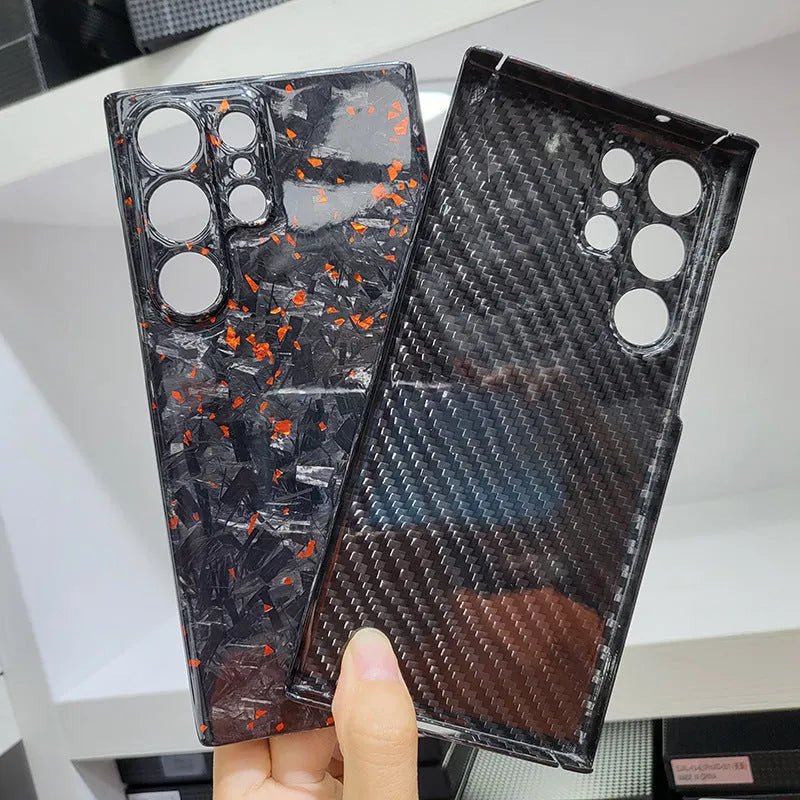 Forged carbon fibre phone case with gold foil finish for Samsung S25 Ultra, displayed on a white background