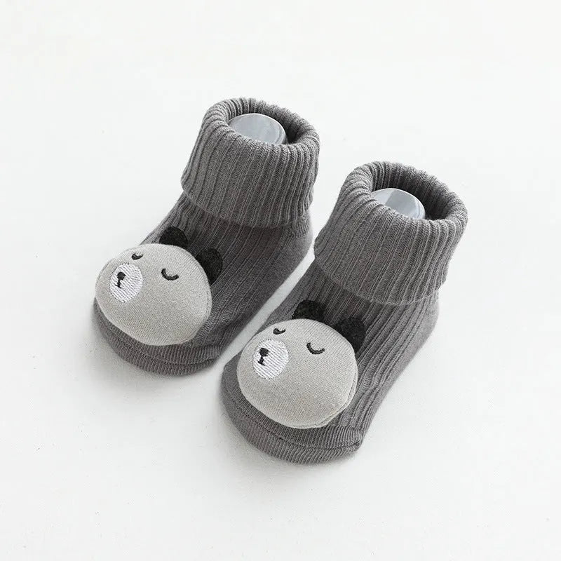 Non-slip baby socks with dispensing glue feature in cotton material, showing mid-calf height and colour options