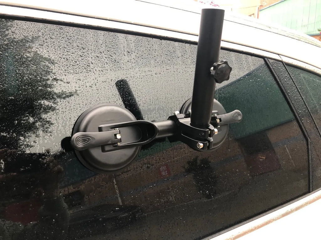 Black off-road car windscreen sucker base with a round glass suction cup and heavy rubber disc.