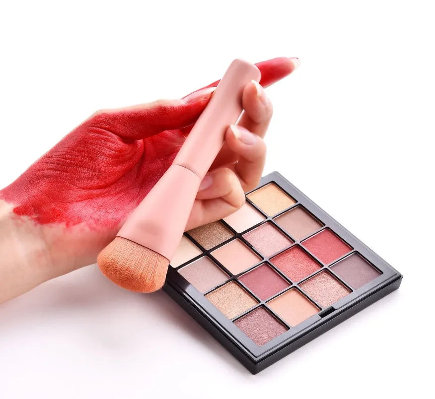 10-piece wooden handle makeup brush set including powder, foundation, eyeshadow, concealer, and lip brushes on pink background