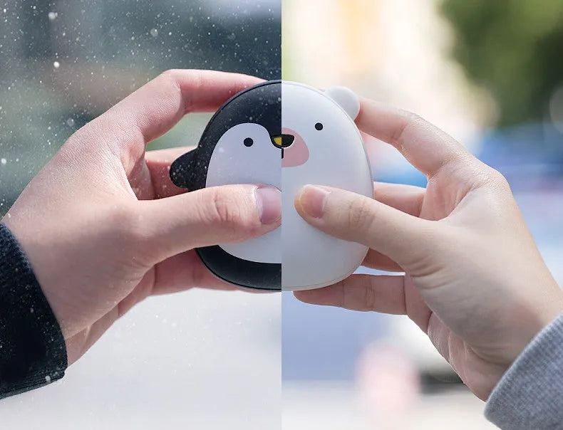 Cartoon penguin polar bear USB rechargeable hand warmer power bank showing black, white, and white-black colour options