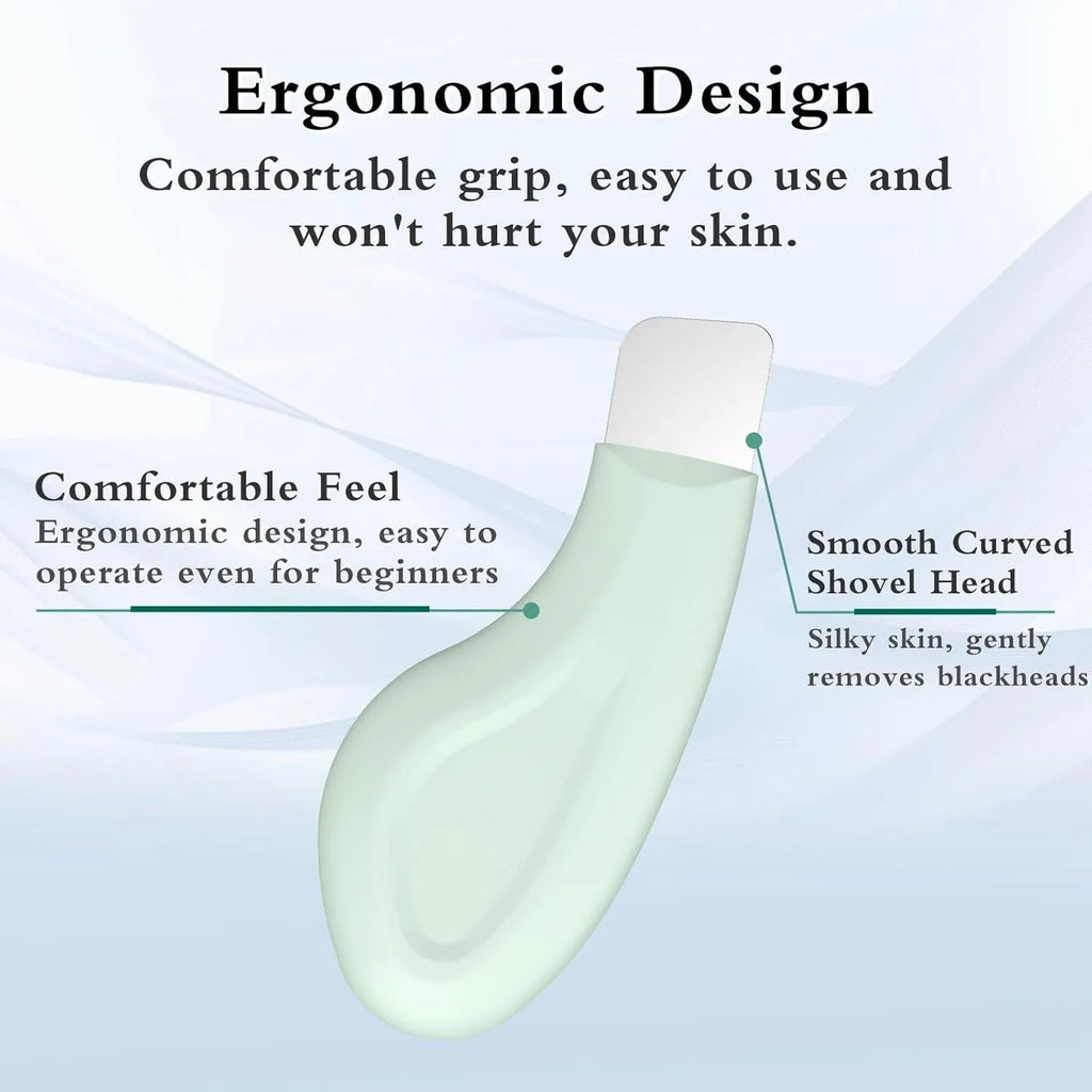 Stainless steel pore scraper face tool with a green silicone non-slip handle.