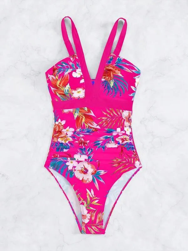 Floral patterned women's one-piece swimsuit with a backless bikini-style design