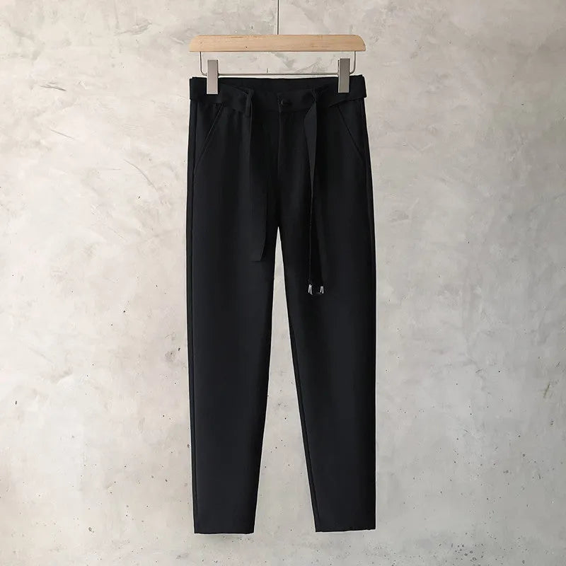 Boys slim straight wool blend trousers in neutral colours with tapered leg design