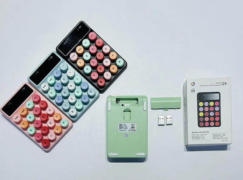 Q3 wireless mini keyboard in Macaron colours on desk