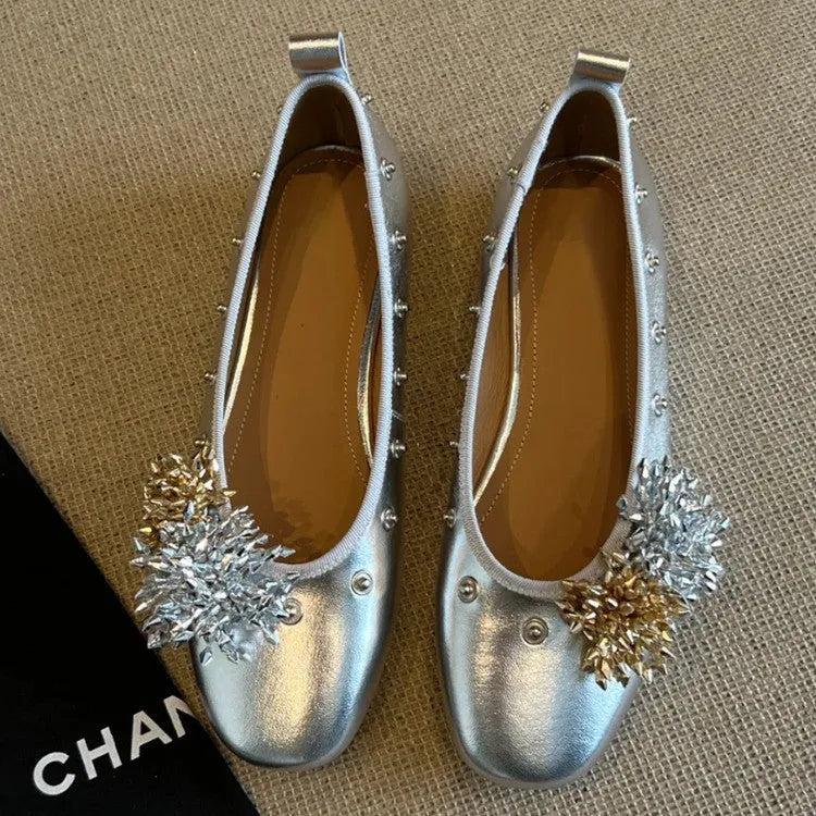 Solid colour sheepskin Mary Jane flat shoes with a round toe and buckle fastening.