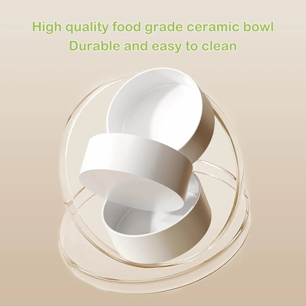 Green ceramic elevated cat feeder with two tilted bowls on a non-slip stand
