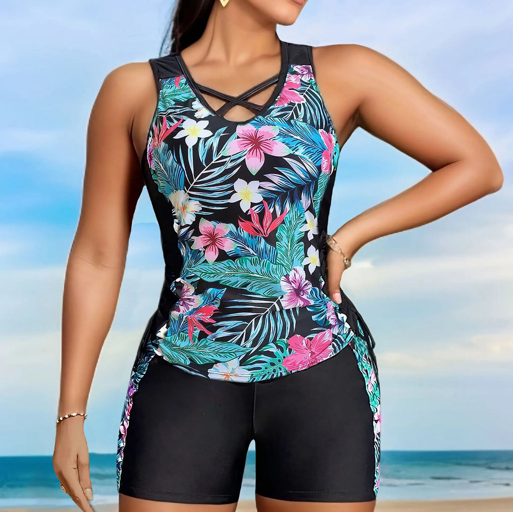 Plus size women's floral print swimsuit bikini with high waist briefs in navy blue.