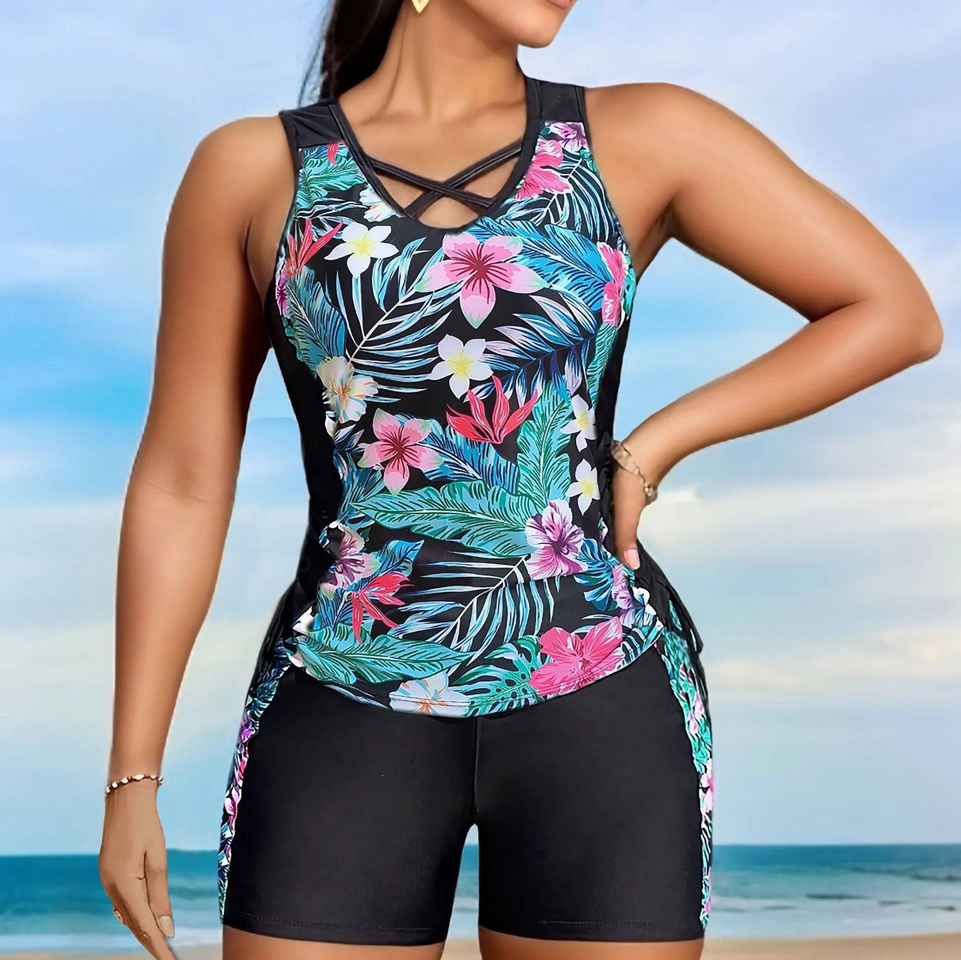 Plus size women's floral print swimsuit bikini with high waist briefs in navy blue.
