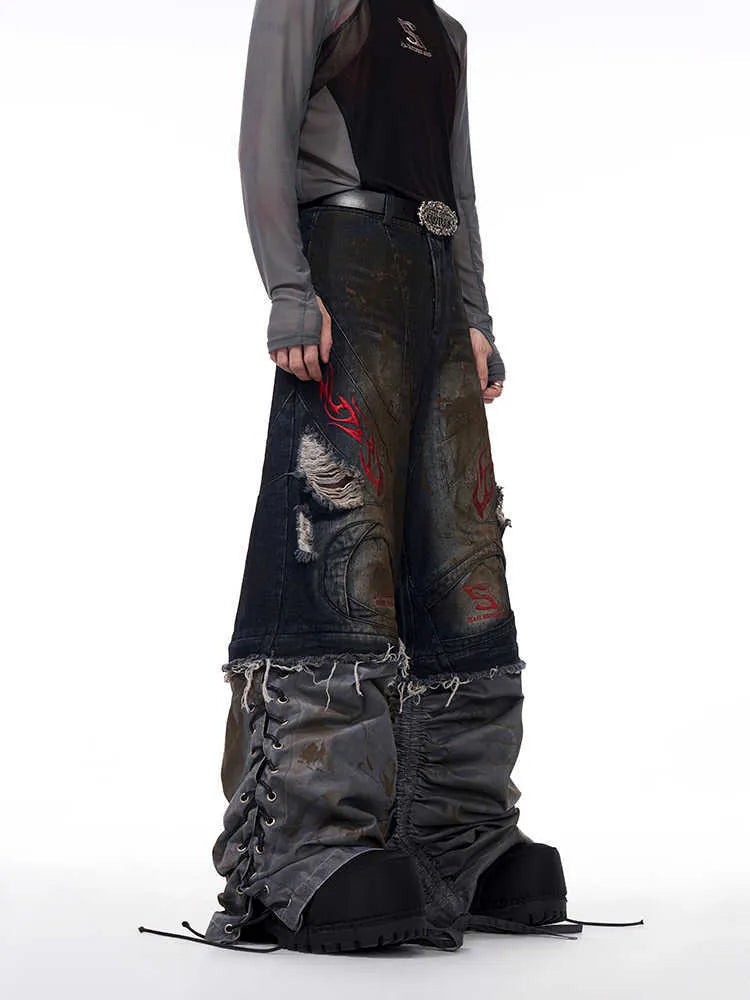 Men's loose fit retro jeans with detachable trouser legs in denim.