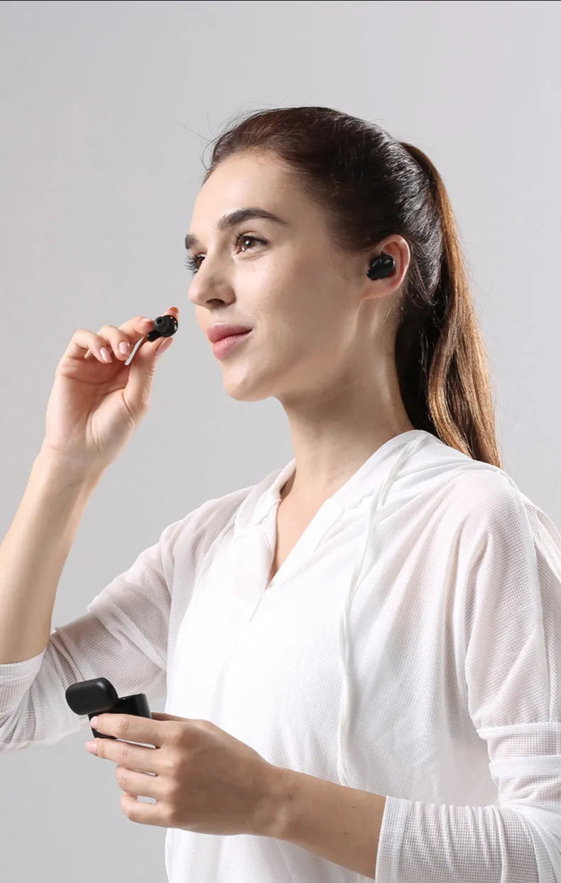 True wireless Bluetooth sports headphones in pearl white and magic night black colours