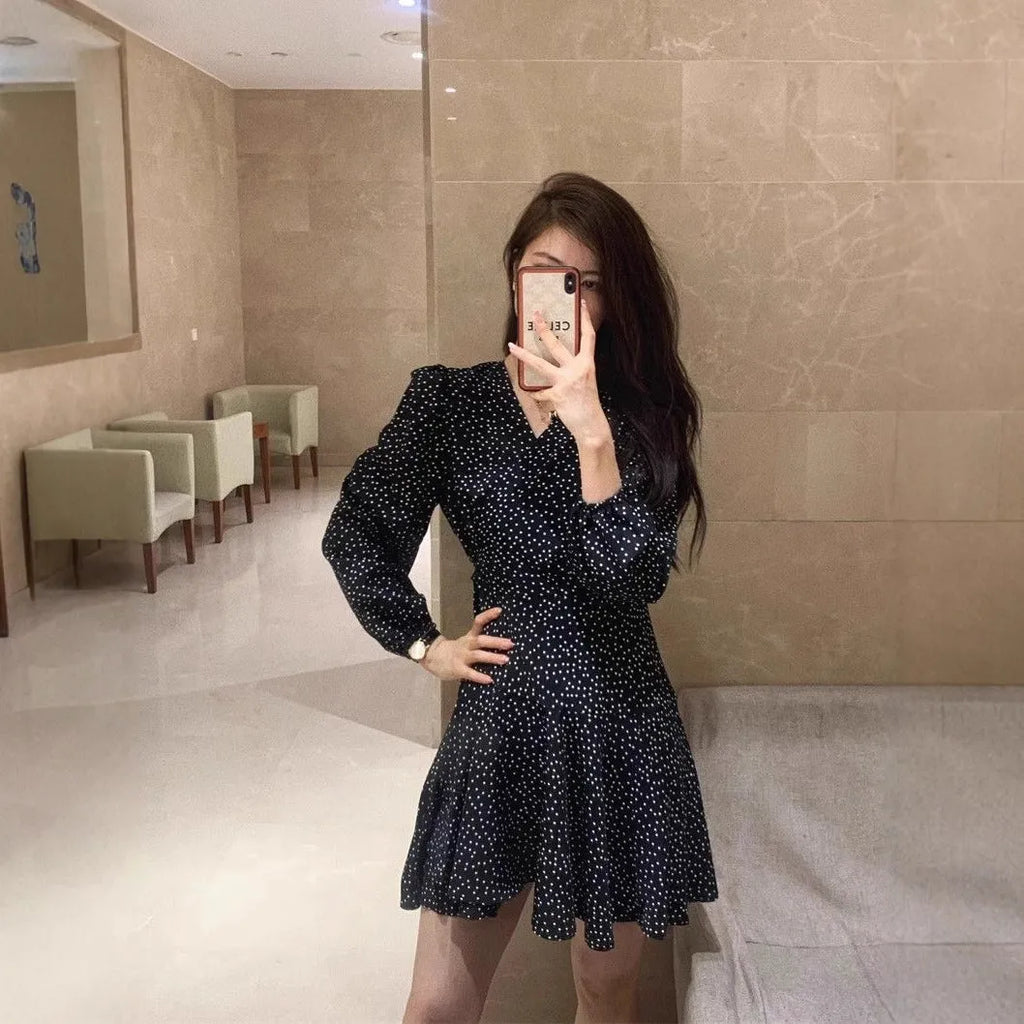 Women's black polka dot high waist midi dress with long sleeves in polyester fabric