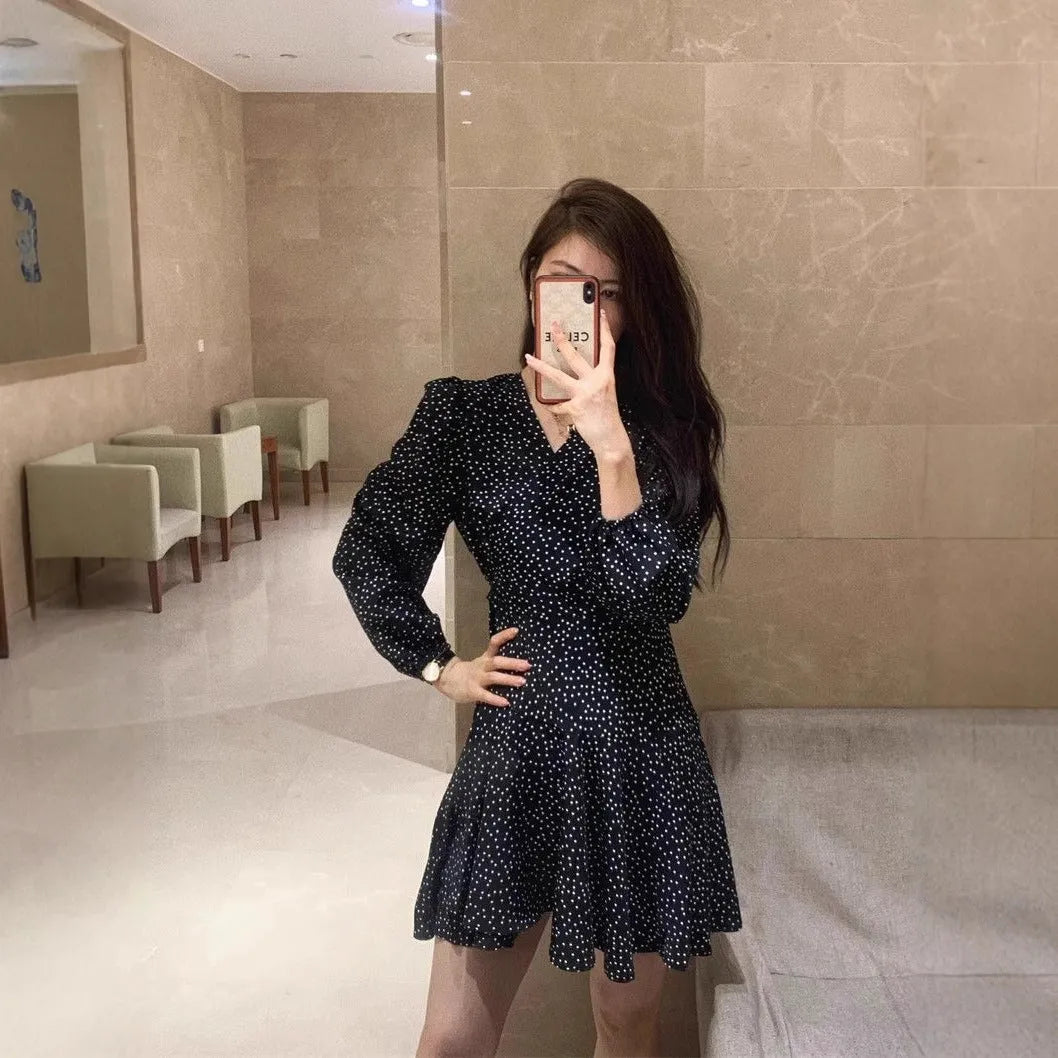 Women's black polka dot high waist midi dress with long sleeves in polyester fabric