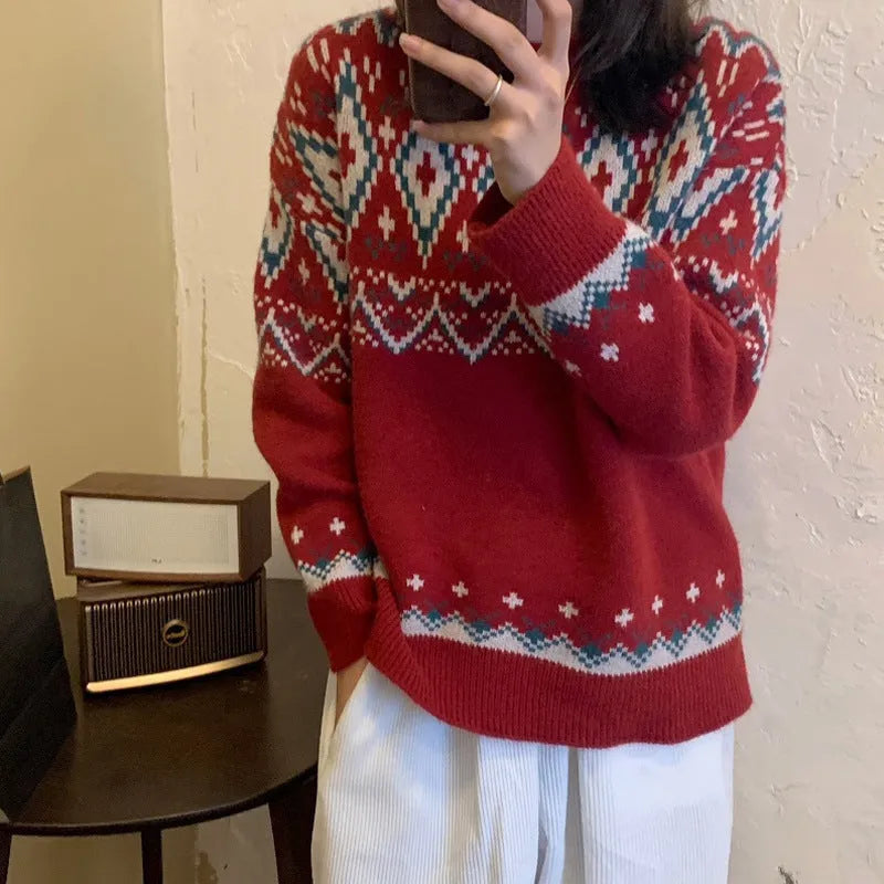 A loose-fitting striped knitted pullover top with long sleeves, shown in red and white colour options.