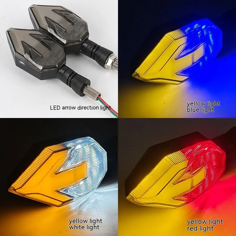 Arrow-shaped LED motorcycle turn signal light with 12V label and ABS plastic housing.