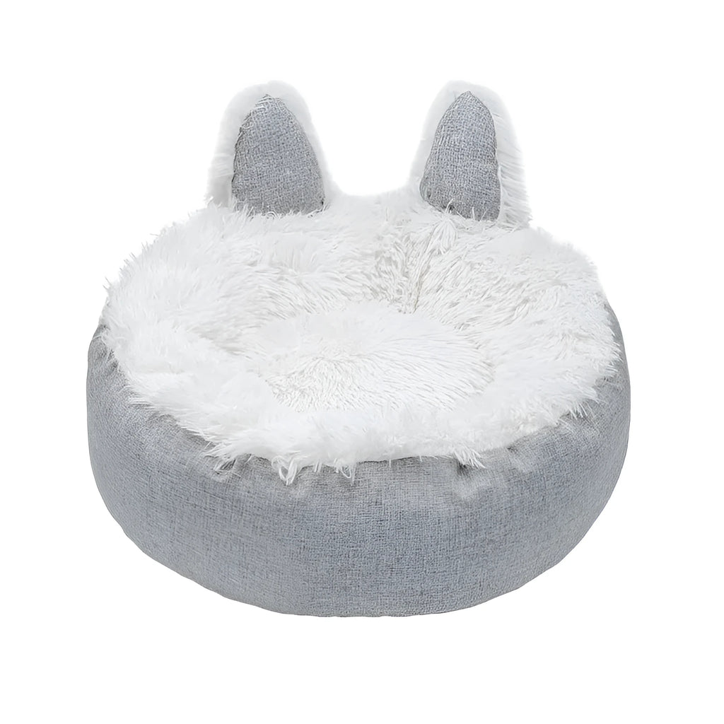 Plush faux fur circular pet bed for cats and small dogs in blue colour showing soft textured material