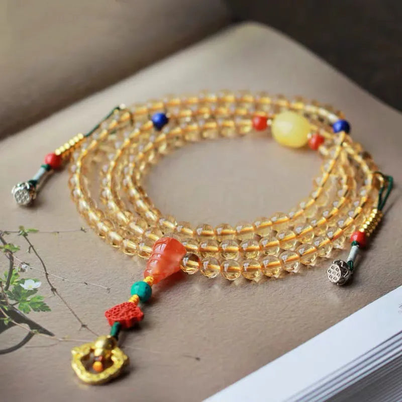 Yellow Brazil natural citrine bracelet with red and yellow body colour and 1mm diameter beads